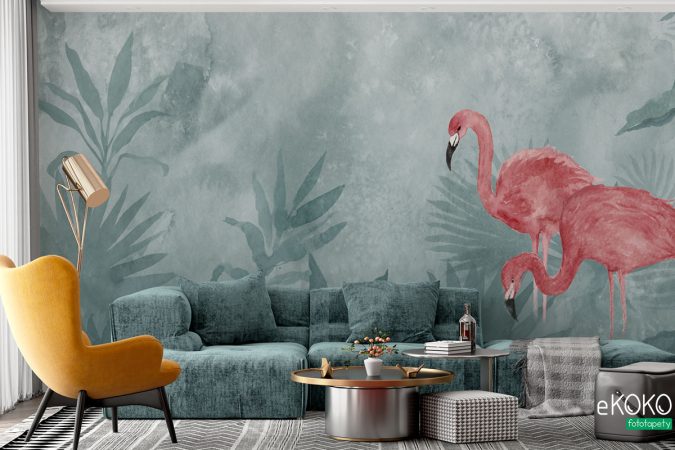 różowe flamingi na zielonym polu traw - fototapeta